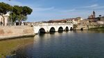 The "Tiberio's Bridge" (Tiberii pons) stands firmly connecting the historical centre of the city to the ancient medieval district across the Marecchia river. It's the proof of Roman's superior engeneering fullfilling its function thousands of years later. (N 44° 3' 49,12" E 12° 33' 49,871")