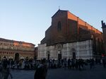 The unfinished Basilica of San Petronio is the sixth largest church in Europe (it is the largest brick Gothic church). The Episcopal Church of Bologna is not San Petronio but the near Saint Peter's Cathedral. The construction started in 1390 under the supervision of the architect Antonio di Vincenzo. In 1514 there was a new project by Aruino degli Arriguzzi. The Basilica had to become bigger than St. Peter's in Rome, but Pope Pio IX requested to build "Archiginnasio" (the university library) 12 meters far from the church and its construction had to stop. The building was built for civic will, not ecclesiastical. It was an act of religious faith but above all political. It is a monument that represents municipal ideals of freedom and authonomy. Localization: 44°29'36.5"N 11°20'35.2"E