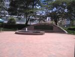 This is the August 7th Memorial park in Nairobi, Kenya. It symbolises the ability of the city to move forward after a devastating terrorist attack at the heart of the city. In a way it is a reflection of the national anthem, which encourages us to live in peace, love and unity. We interpret the landscape to mean how much we value peace, love and unity among fellow country men and women.