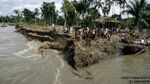 This image presents natural river bank erosion of mighty Padma river located in Faridpur (a district of Bangladesh) which causes immense sufferings to the local people. So this landscape may be a decent illustration where people’s participation is required to fight against natural calamities.