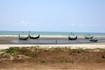 Cox's Bazar Beach, located at Cox's Bazar, Bangladesh, is the longest unbroken sea beach in the world. Cox's Bazar is the prime beach and tourist town in Bangladesh, situated alongside the beach of the Bay of Bengal, beside the Indian Ocean, having unbroken 120 Kilometer golden sand beach. This town is situated in the Chittagong Division in south-eastern Bangladesh. Cox's Bazar is a city, fishing port, tourism centre and district headquarters in Bangladesh. This is the most visited place in Bangladesh, with its beautiful refreshing green hills, traditional boats and the wonderful sea beach. Over many years Cox's Bazar has been an attraction to both international and domestic tourists. Opportunities of bathing and swimming in shark free warm water makes Cox’s Bazar a top tourist attraction.