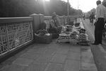 "Not sorry for the inconvenience"- Pathway, Ahmedabad, India (coordinates- 22.6 N and 72.3 E). One needs to step back and look at the larger picture. Why has this man, set up an establishment for selling items on a pathway? Lack of planning in existing so-called modern cities. Inhumane environment accompanied by the lack of political willingness. Symbolic to social imbalance, unplanned growth. Tag: Political and social.