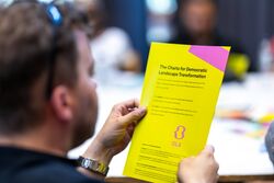 Participants study the Charta for themselves first