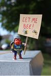 "Let me BEE" - close up of a playmobile protester.